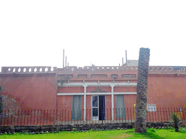 pgmi auditorium with top storey intact and after it was demolished photo hidayat khan express