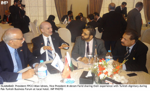 president fpcci mian idrees sharing their experience with turkish dignitary during pak turkish business forum photo inp president fpcci mian idrees sharing their experience with turkish dignitary during pak turkish business forum photo inp