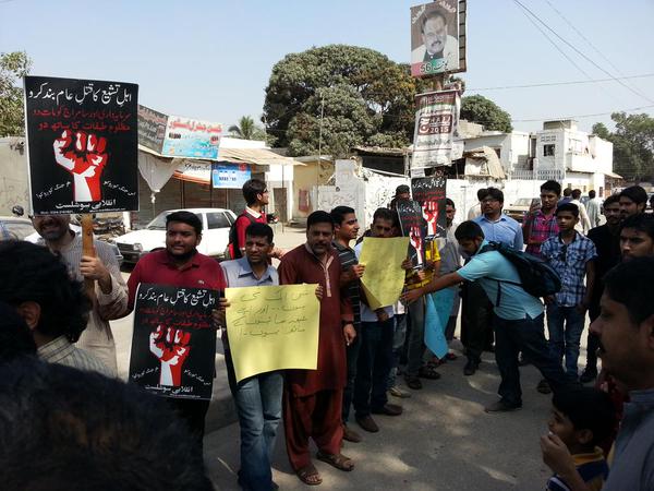 civil society forms human shield outside imambargah in karachi