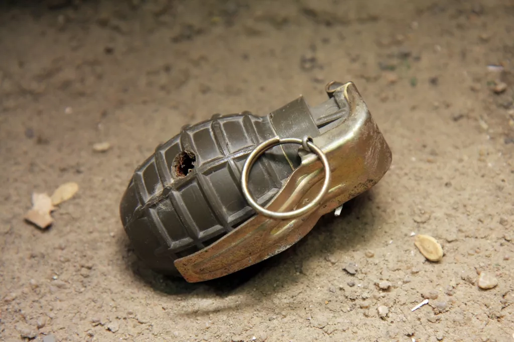 the militant lobbed a grenade at them and fled there were no casualties because the grenade failed to explode stock image the militant lobbed a grenade at them and fled there were no casualties because the grenade failed to explode stock image