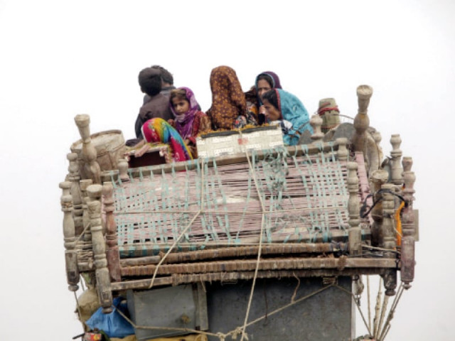 an afghan family leaves a refugee camp in the outskirts of karachi the sindh government has decided to establish more refugee camps for afghan nationals outside the city photo file an afghan family leaves a refugee camp in the outskirts of karachi the sindh government has decided to establish more refugee camps for afghan nationals outside the city photo file