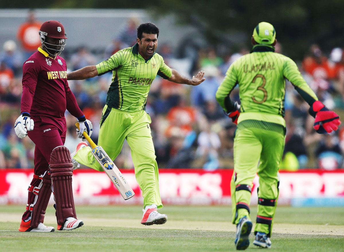 sohail khan c celebrates dismissing west indies 039 batsman dwayne smith l during their cricket world cup match in christchurch february 21 2015 photo reuters