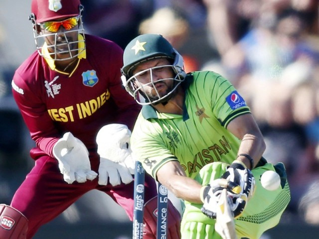 shahid afridi plays a reverse sweep during the pakistan vs west indies match photo reuters shahid afridi plays a reverse sweep during the pakistan vs west indies match photo reuters
