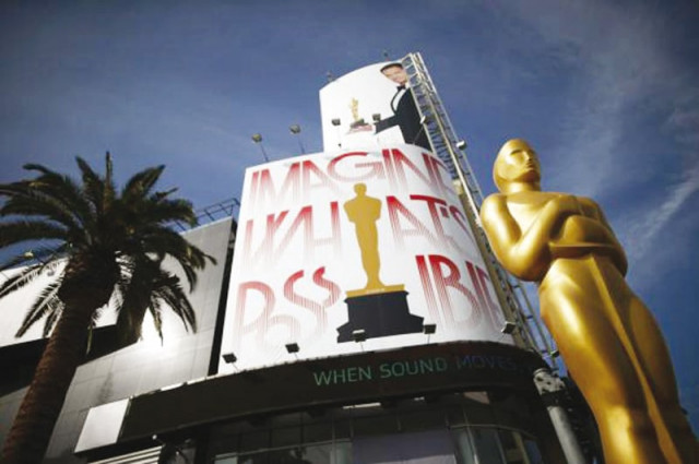 an oscar statue is seen outside the dolby theater during preparations ahead of the 87th academy awards in hollywood photo reuters an oscar statue is seen outside the dolby theater during preparations ahead of the 87th academy awards in hollywood photo reuters