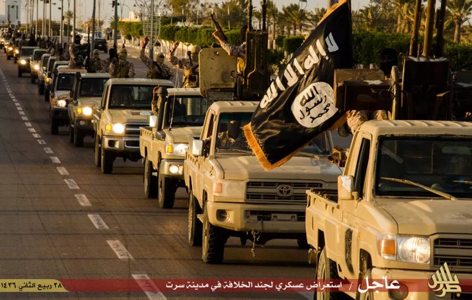 an image made available by propaganda islamist media outlet welayat tarablos on february 18 2015 allegedly shows members of the islamic state militant group parading in a street in libya 039 s coastal city of sirte photo afp an image made available by propaganda islamist media outlet welayat tarablos on february 18 2015 allegedly shows members of the islamic state militant group parading in a street in libya 039 s coastal city of sirte photo afp