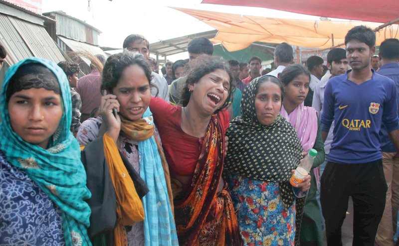 relatives cry as they mourn the death of ferry accident victims photo afp