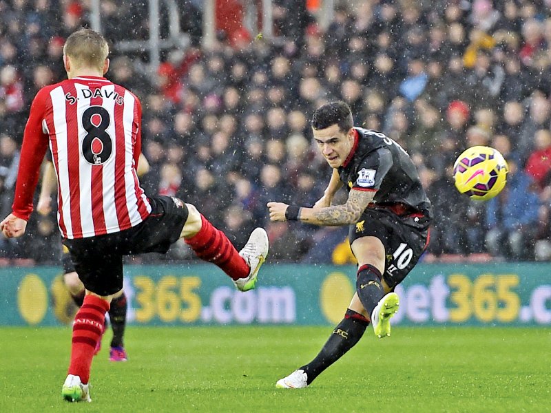 coutinho s exceptional strike and sterling s attempt at ending play at 2 0 proved vital in liverpool s campaign to secure themselves a champions league spot for next season photo afp