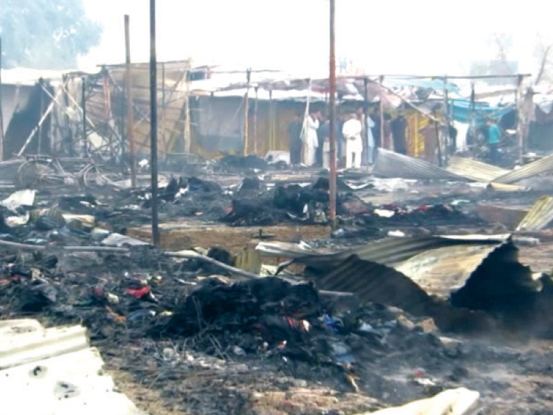 inventory of over a 100 shops were reduced to ashes at a fire that blazed through lunda bazaar in gujrat photo express