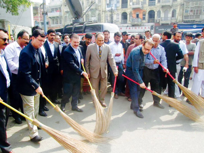 sindh minister for information and local government sharjeel inam memon inaugurates cleanliness campaign at pakistan chowk photo express