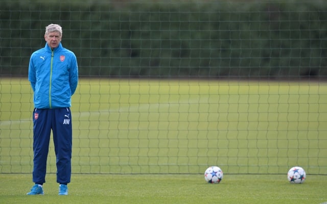 keeping watch arsene wenger conducts first team training in london colney ahead of arsenal s clash against monaco photo afp