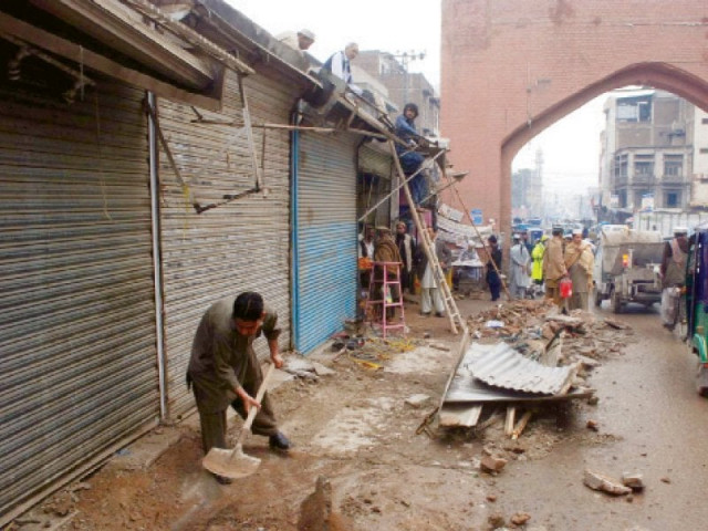 operation against encroachments under way in hashtnagri photo ppi operation against encroachments under way in hashtnagri photo ppi