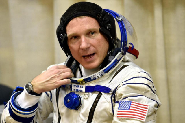 us astronaut terry virts speaks as his space suit is tested prior to blasting off to the international space station iss on november 23 2014 photo afp us astronaut terry virts speaks as his space suit is tested prior to blasting off to the international space station iss on november 23 2014 photo afp
