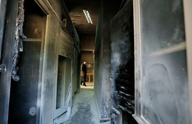 a man looks at damage at a greek orthodox seminary in jerusalem february 26 2015 photo reuters