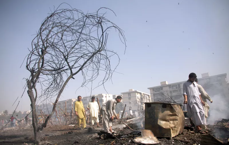 at least 50 makeshift huts were completely demolished when a fire broke out in gulshan e iqbal photo athar khan express at least 50 makeshift huts were completely demolished when a fire broke out in gulshan e iqbal photo athar khan express
