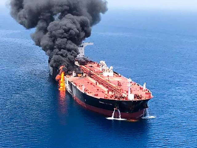 fire and smoke billowing from a tanker said to have been attacked in the gulf of oman photo getty fire and smoke billowing from a tanker said to have been attacked in the gulf of oman photo getty