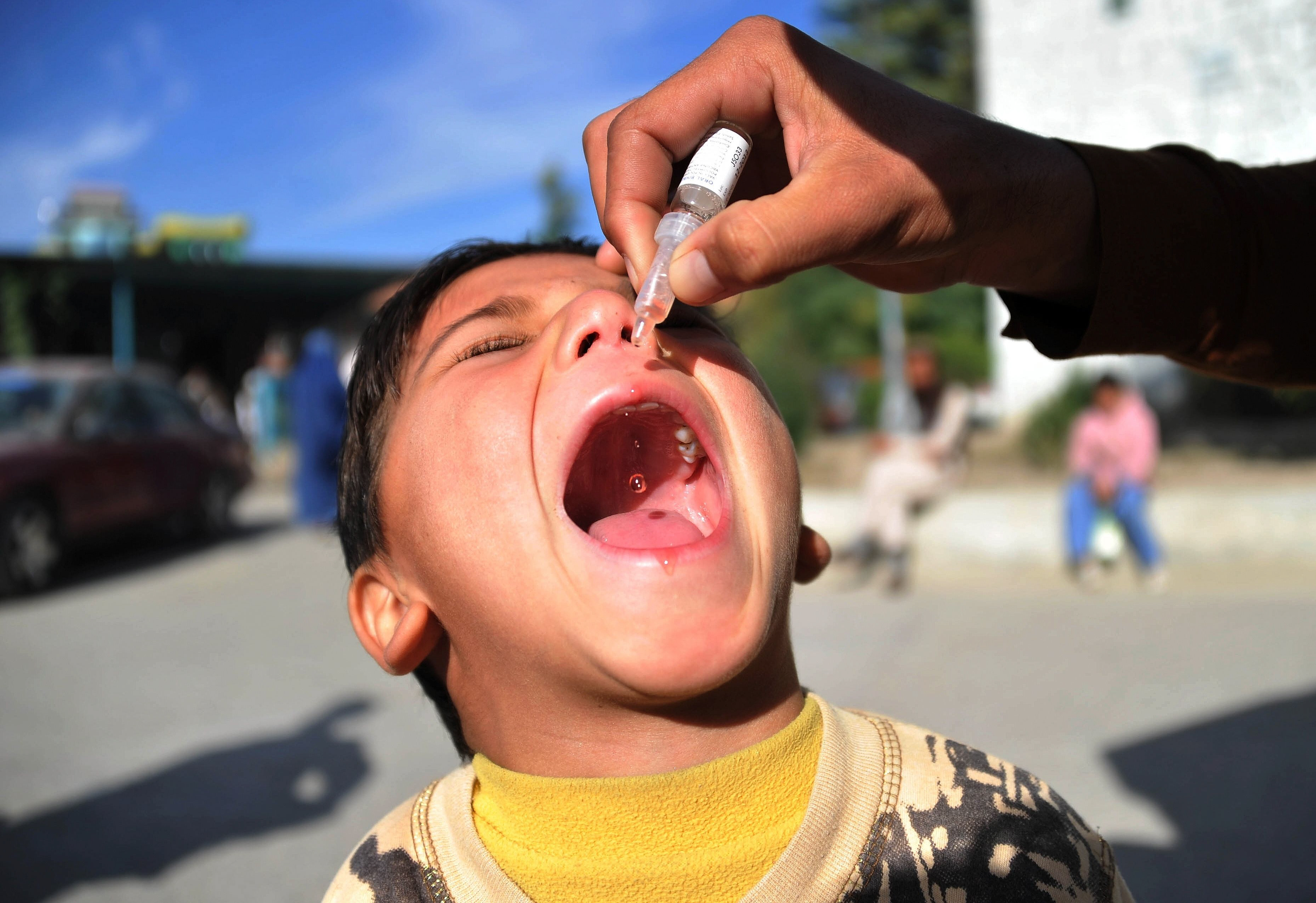 file photo of a child being administered polio drops photo afp