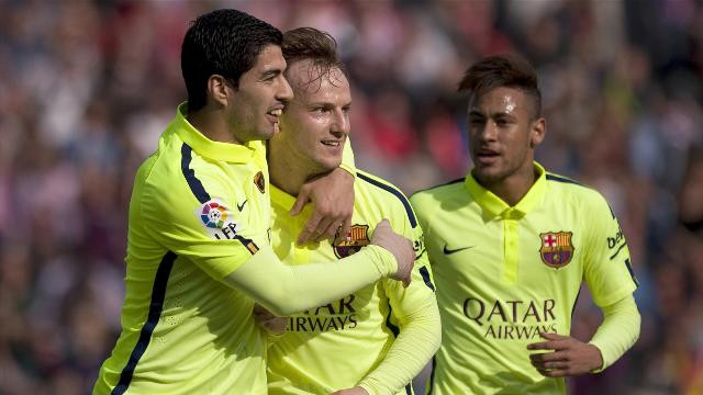 right on the heels barcelona defeated granada 3 1 to finish the week with 59 points and keep the pressure on league leaders real madrid in the fight for the top spot photo afp