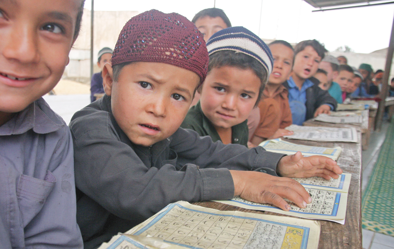 children of afghan refugees in karachi have few options when it comes to education and depend on madrassas in most cases photo athar khan express