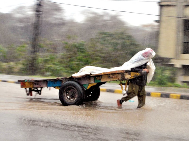 commuters had to face a traffic nightmare in the twin cities due to the incessant rainfall on monday photo zafar aslam express inp commuters had to face a traffic nightmare in the twin cities due to the incessant rainfall on monday photo zafar aslam express inp