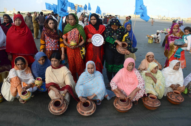 a caravan led by pff chairperson muhammad ali shah gathered at seaview where they threw rose petals and poured freshwater into the sea symbolically quenching its thirst photo irfan ali express a caravan led by pff chairperson muhammad ali shah gathered at seaview where they threw rose petals and poured freshwater into the sea symbolically quenching its thirst photo irfan ali express