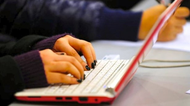 under phase one of the scheme as many as 93 975 laptops have been delivered in 86 universities and degree awarding institutes photo afp under phase one of the scheme as many as 93 975 laptops have been delivered in 86 universities and degree awarding institutes photo afp