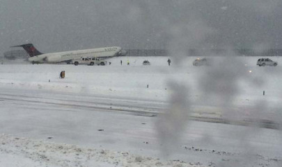 plane with 125 people onboard skids off new york runway