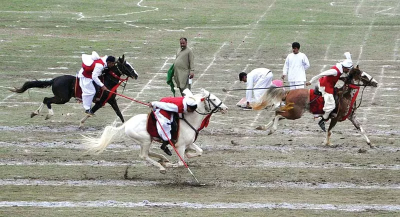 tent pegging competition on the opening day of the show top motorcycle stunts being performed by army men above photos app tent pegging competition on the opening day of the show top motorcycle stunts being performed by army men above photos app