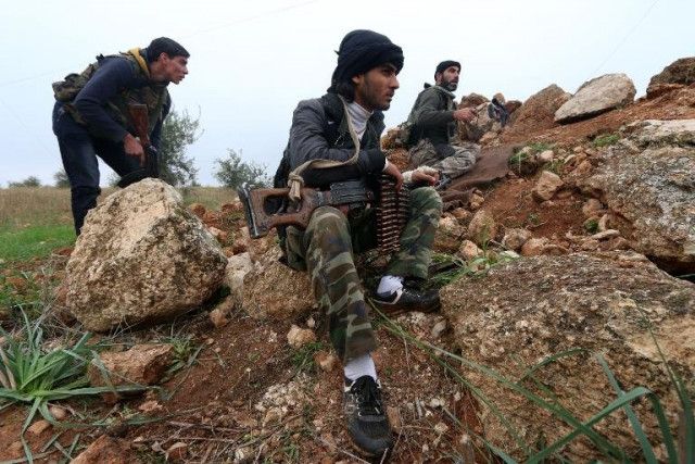fighters from the al nusra front al qaeda 039 s syria branch hold a position near syria 039 s northern city of aleppo as they fight against forces loyal to the regime on december 19 2014 photo afp fighters from the al nusra front al qaeda 039 s syria branch hold a position near syria 039 s northern city of aleppo as they fight against forces loyal to the regime on december 19 2014 photo afp