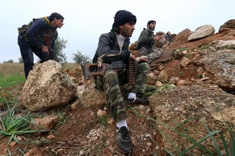 fighters from the al nusra front al qaeda 039 s syria branch hold a position near syria 039 s northern city of aleppo as they fight against forces loyal to the regime on december 19 2014 photo afp fighters from the al nusra front al qaeda 039 s syria branch hold a position near syria 039 s northern city of aleppo as they fight against forces loyal to the regime on december 19 2014 photo afp