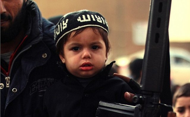 militants mothers and babies living in is territory in syria and iraq seen donning pro is merchandise photo daily mail