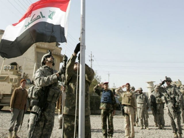 a us and an iraqi soldier raise the iraqi national flag during the handover ceremony of a military camp to the iraqi army in baghdad 039 s gazaliya district on january 1 2009 photo reuters a us and an iraqi soldier raise the iraqi national flag during the handover ceremony of a military camp to the iraqi army in baghdad 039 s gazaliya district on january 1 2009 photo reuters
