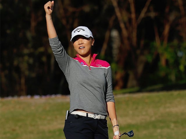 new zealand teen ko and world number three lewis were tied at 11 under after both made the most of slightly cooler temperatures in steamy singapore to fire 67s photo afp