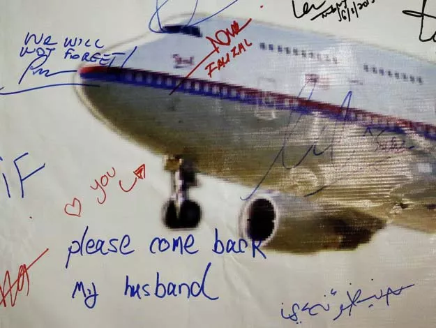 a message left on a board of remembrance by kelly last name not given 29 the wife of a passenger aboard missing malaysia airlines flight mh370 at a vigil ahead of the one year anniversary of its disappearance in kuala lumpur photo reuters a message left on a board of remembrance by kelly last name not given 29 the wife of a passenger aboard missing malaysia airlines flight mh370 at a vigil ahead of the one year anniversary of its disappearance in kuala lumpur photo reuters