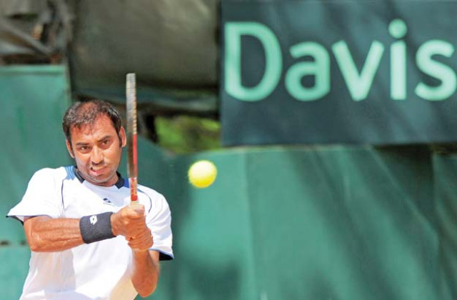 despite going into the deciding rubber under pressure aqeel khan took an easy win over dawood sayed hashim 6 2 6 1 6 2 to help his team reach the second round photo despite going into the deciding rubber under pressure aqeel khan took an easy win over dawood sayed hashim 6 2 6 1 6 2 to help his team reach the second round photo