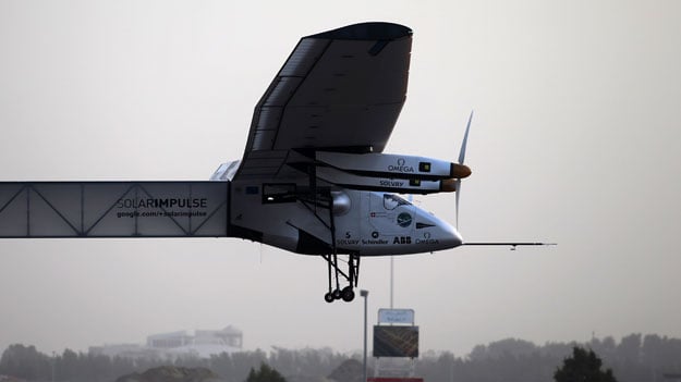 the solar impulse 2 takes off from al bateen airport in abu dhabi as it heads to muscat on march 9 2015 in the first attempt to fly around the world in a plane using solar energy photo afp