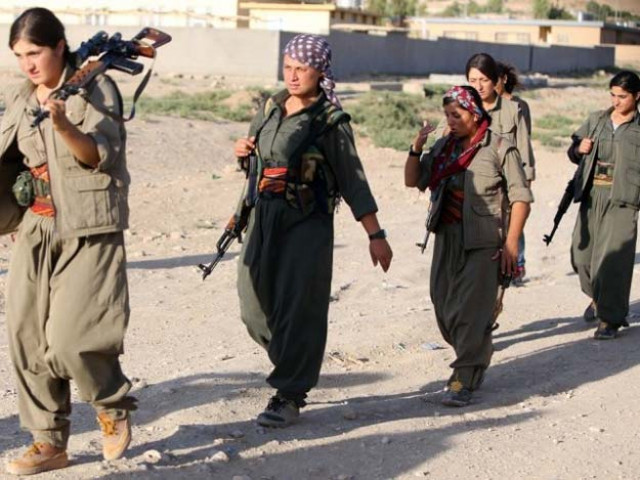 a picture taken on august 21 2014 shows women kurdistan workers party pkk patrolling on the front line in the makhmur area near mosul during the ongoing conflict against islamic state is militants photo afp a picture taken on august 21 2014 shows women kurdistan workers party pkk patrolling on the front line in the makhmur area near mosul during the ongoing conflict against islamic state is militants photo afp