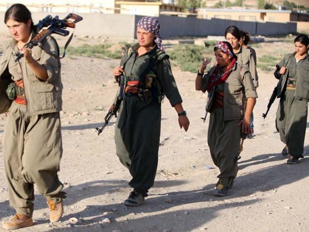 a picture taken on august 21 2014 shows women kurdistan workers party pkk patrolling on the front line in the makhmur area near mosul during the ongoing conflict against islamic state is militants photo afp