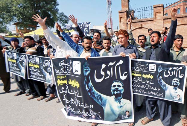 hundreds of people from different areas of the city joined the protest outside peshawar press club photo muhammad iqbal express