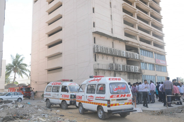 an air conditioner fixed on the floor caught fire due to a technical fault photo mohammad noman express an air conditioner fixed on the floor caught fire due to a technical fault photo mohammad noman express