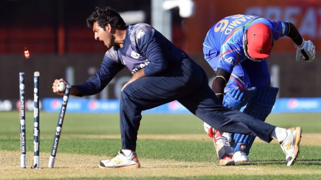 hamid hassan makes his ground in time to beat majid haq afghanistan v scotland world cup 2015 group a dunedin february 26 2015 photo afp hamid hassan makes his ground in time to beat majid haq afghanistan v scotland world cup 2015 group a dunedin february 26 2015 photo afp