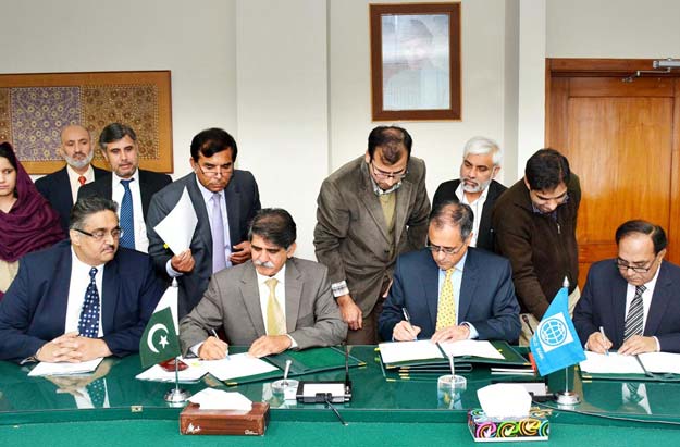 secretary economic affairs division muhammad saleem sethi and world bank country director rachid benmessaoud signing the agreements on wednesday photo pid