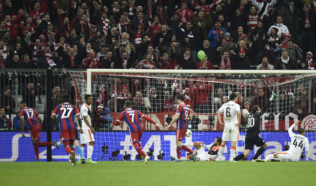 bayern munich 039 s defender jerome boateng l celebrates scoring the 2 0 goal during the uefa champions league second leg round of 16 football match fc bayern munich vs shakhtar donetsk in munich southern germany on march 11 2015 photo afp