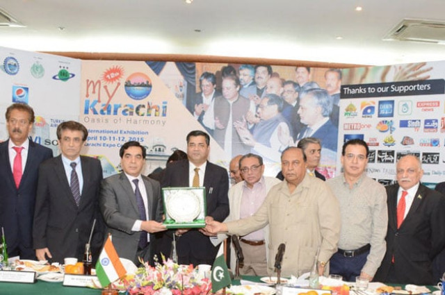 indian high commioner tcv raghavan being presented a memento during his visit to kcci on thursday photo nni indian high commioner tcv raghavan being presented a memento during his visit to kcci on thursday photo nni