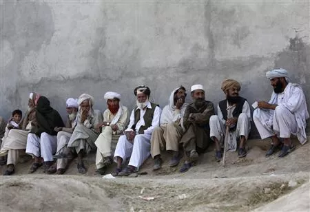 men fleeing a military offensive wait outside a registration point for internally displaced persons idps in dera ismail khan photo reuters men fleeing a military offensive wait outside a registration point for internally displaced persons idps in dera ismail khan photo reuters