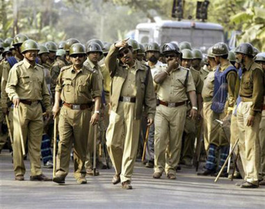 india police tear gas protesters outside state parliament