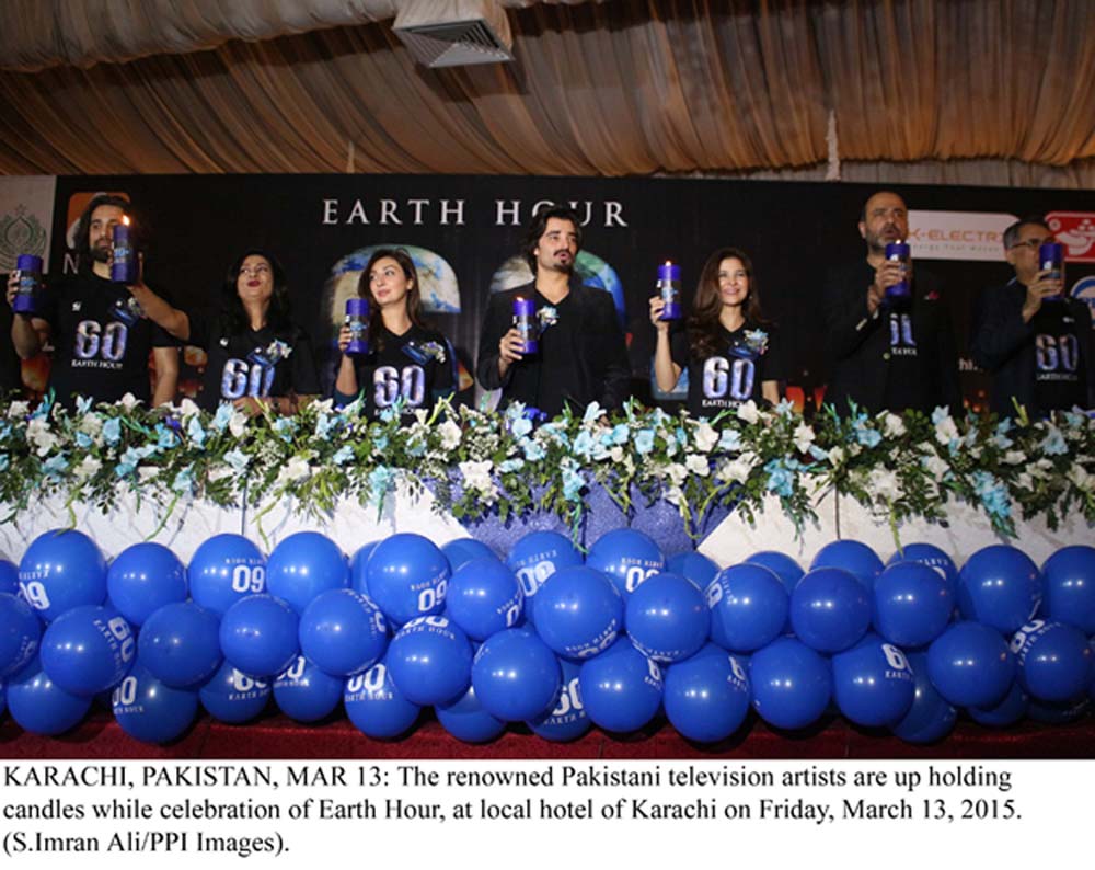 pakistani tv artists are up holding candles while celebrating earth hour photo ppi