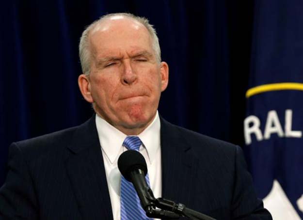 director of the central intelligence agency john brennan pauses while he holds a rare news conference at the cia headquarters in virginia december 11 2014 photo reuters