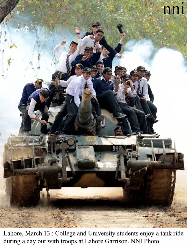 college and university students enjoy a tank ride during a day out with the troops at lahore garrison photo nni