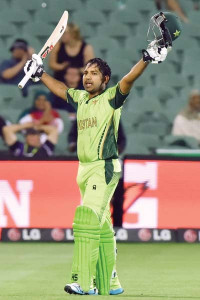 sarfraz s century guides pakistan into quarter finals