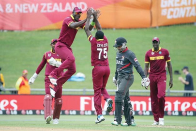 west indies into quarter finals with uae win